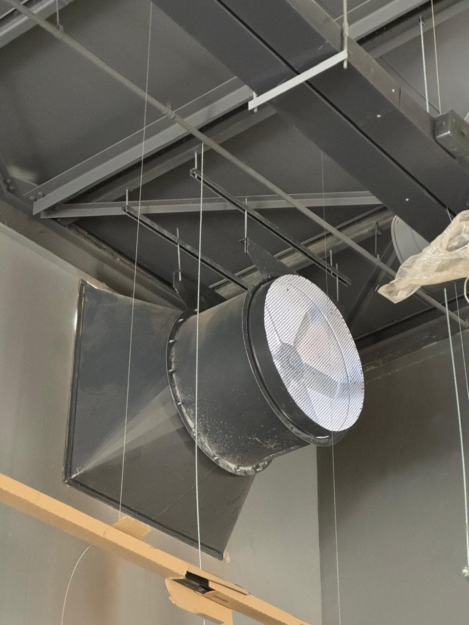 Installed smoke-extraction fan and ductwork